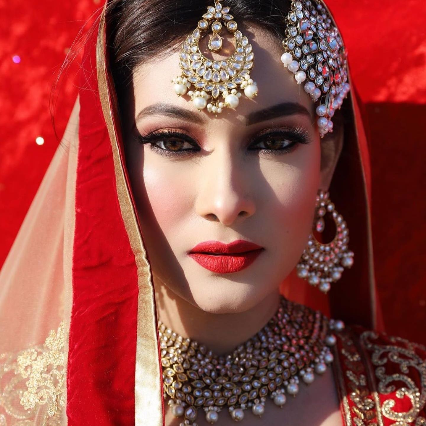 Red bridal makeup by Fefe Artist
